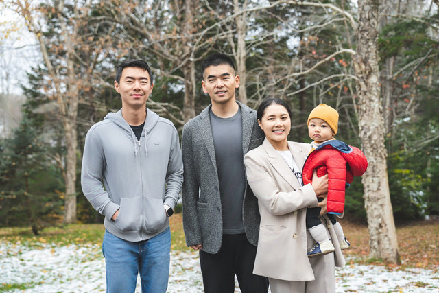Yuan He, Lloyd Liu, and family outdoors in Nova Scotia